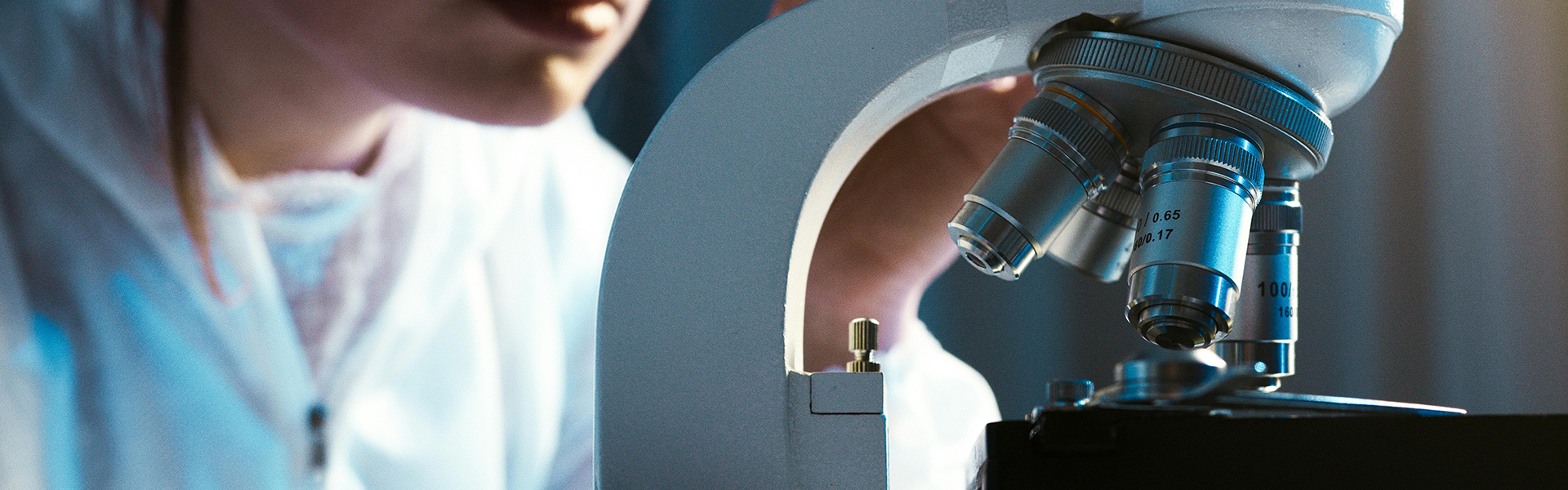 Woman using a microscope